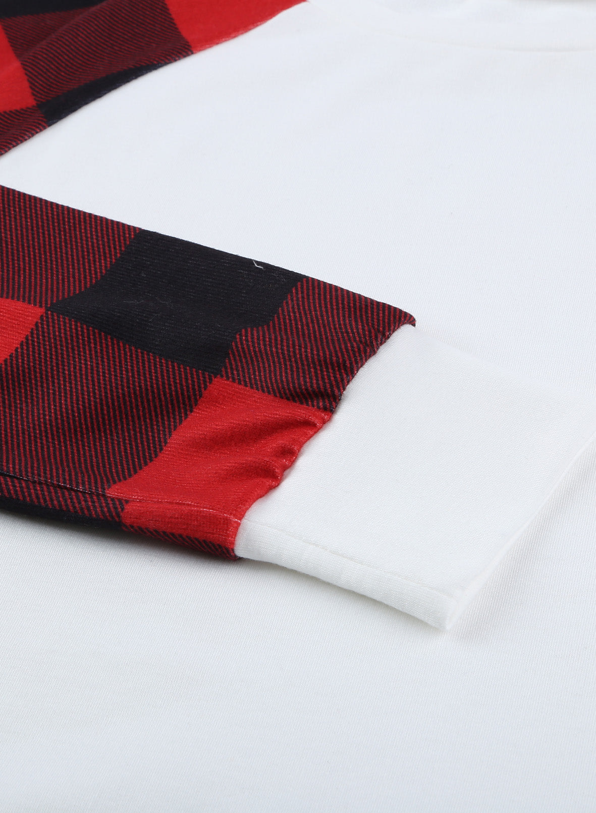 Black Buffalo Plaid Long Sleeve Sweatshirt featuring a cozy cotton blend fabric and stylish patchwork design.