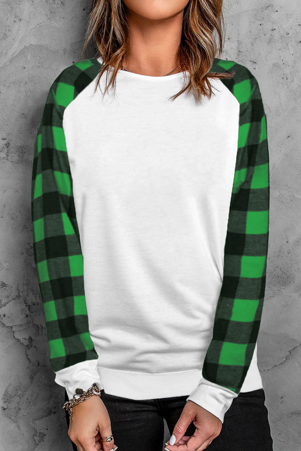 Black Buffalo Plaid Long Sleeve Sweatshirt featuring a cozy cotton blend fabric and stylish patchwork design.