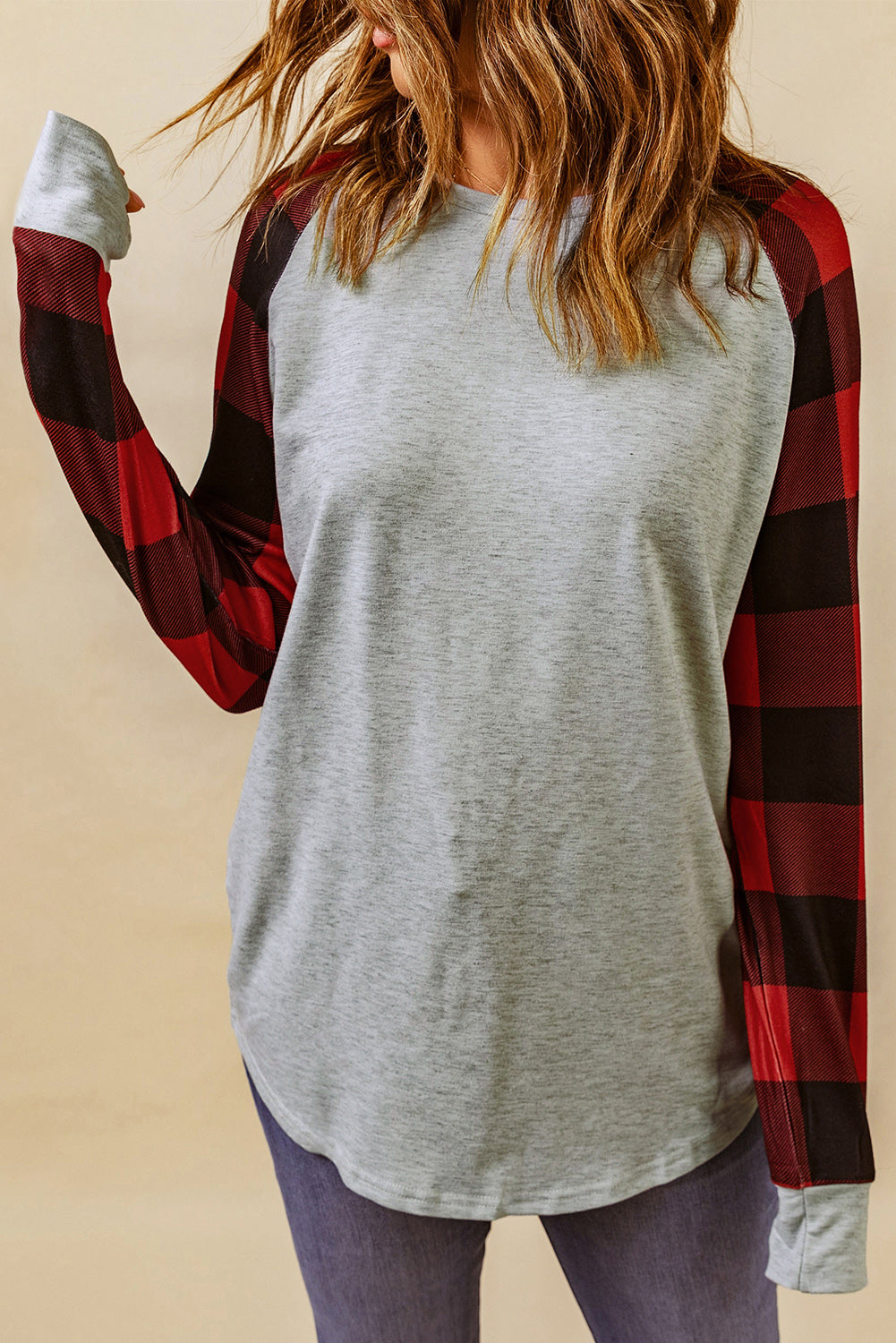 Black Buffalo Plaid Long Sleeve Sweatshirt featuring a cozy cotton blend fabric and stylish patchwork design.