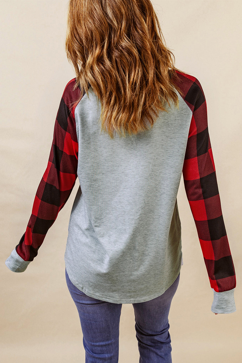 Black Buffalo Plaid Long Sleeve Sweatshirt featuring a cozy cotton blend fabric and stylish patchwork design.