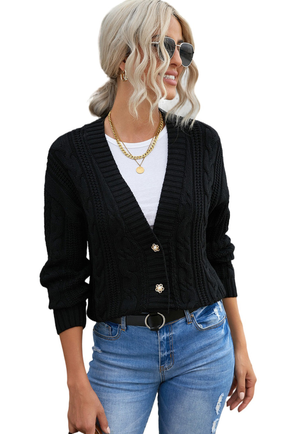 A stylish black knit cardigan featuring button closures, deep v-neck, and long drop-shoulder sleeves, perfect for layering in cold weather.