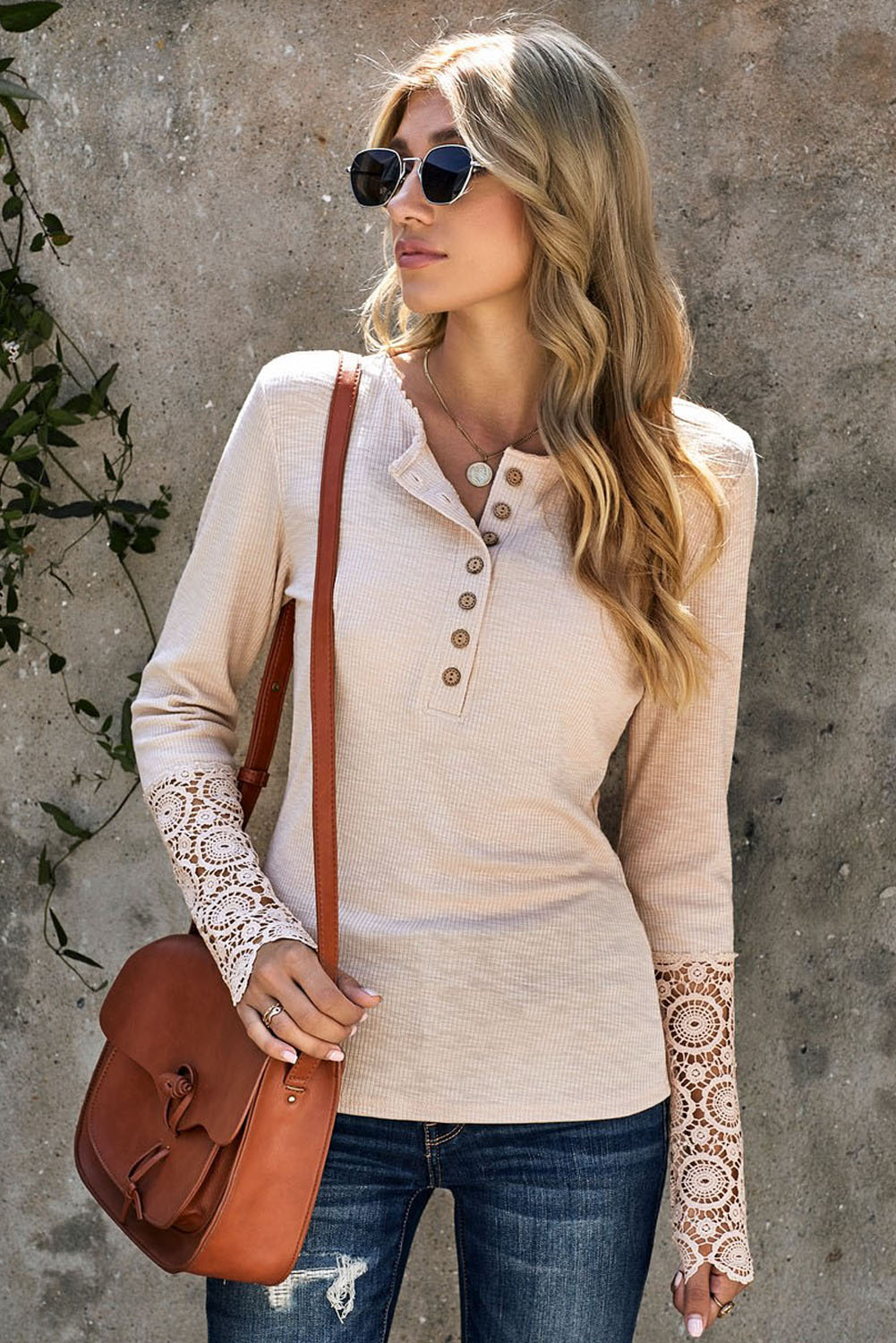 Black Crochet Lace Hem Sleeve Button Top featuring elegant lace sleeves and a stylish half-open collar.