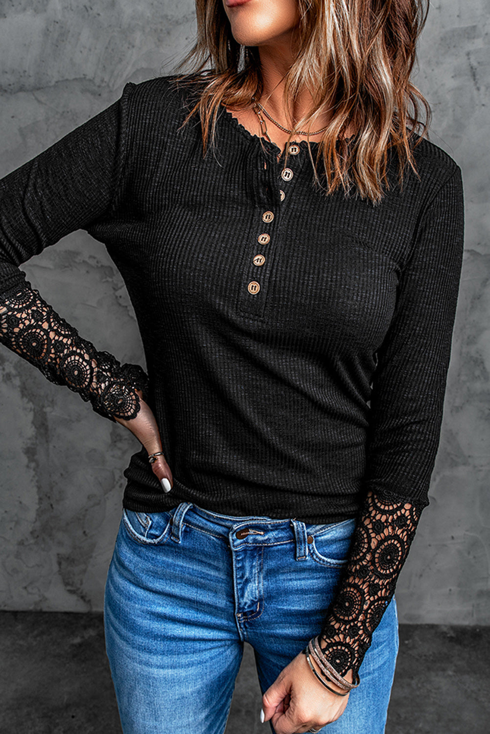 Black Crochet Lace Hem Sleeve Button Top featuring elegant lace sleeves and a stylish half-open collar.