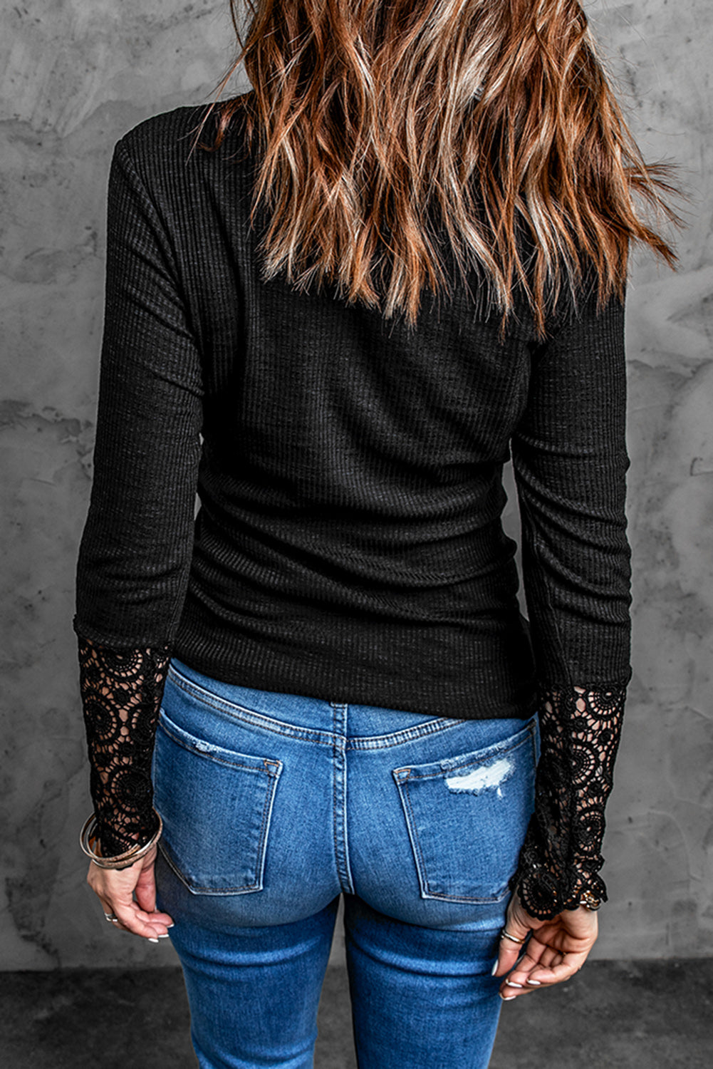 Black Crochet Lace Hem Sleeve Button Top featuring elegant lace sleeves and a stylish half-open collar.