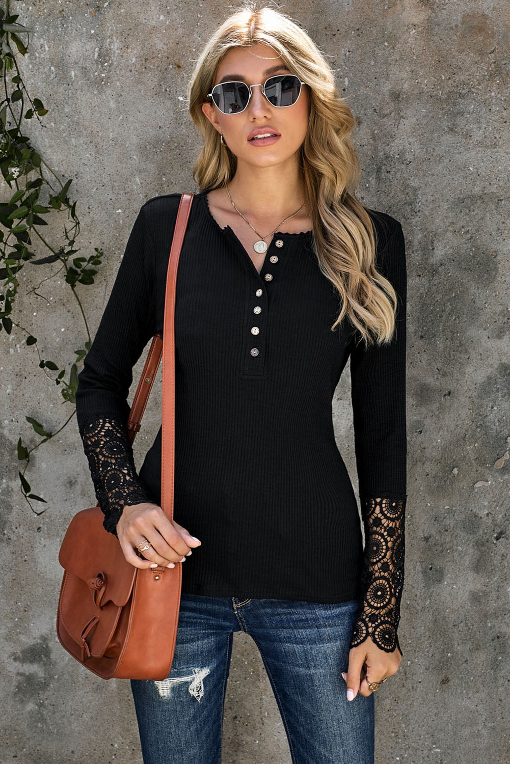 Black Crochet Lace Hem Sleeve Button Top featuring elegant lace sleeves and a stylish half-open collar.