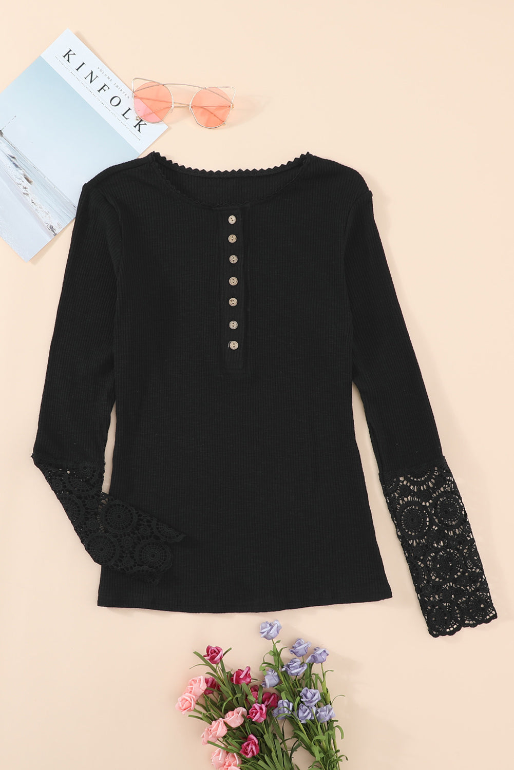 Black Crochet Lace Hem Sleeve Button Top featuring elegant lace sleeves and a stylish half-open collar.