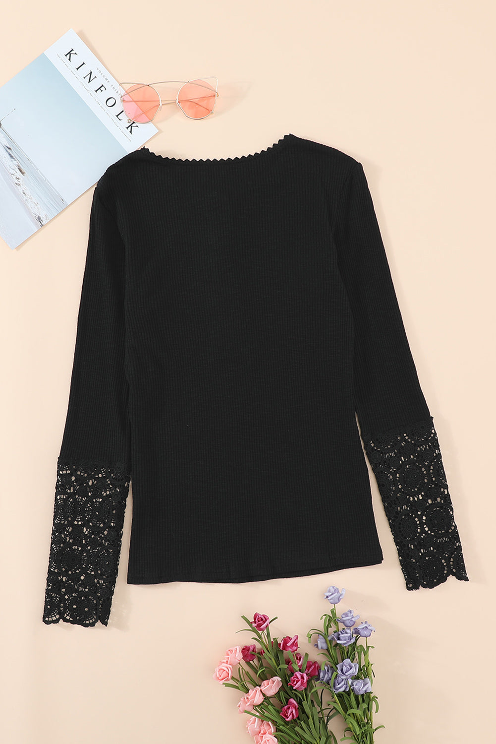 Black Crochet Lace Hem Sleeve Button Top featuring elegant lace sleeves and a stylish half-open collar.