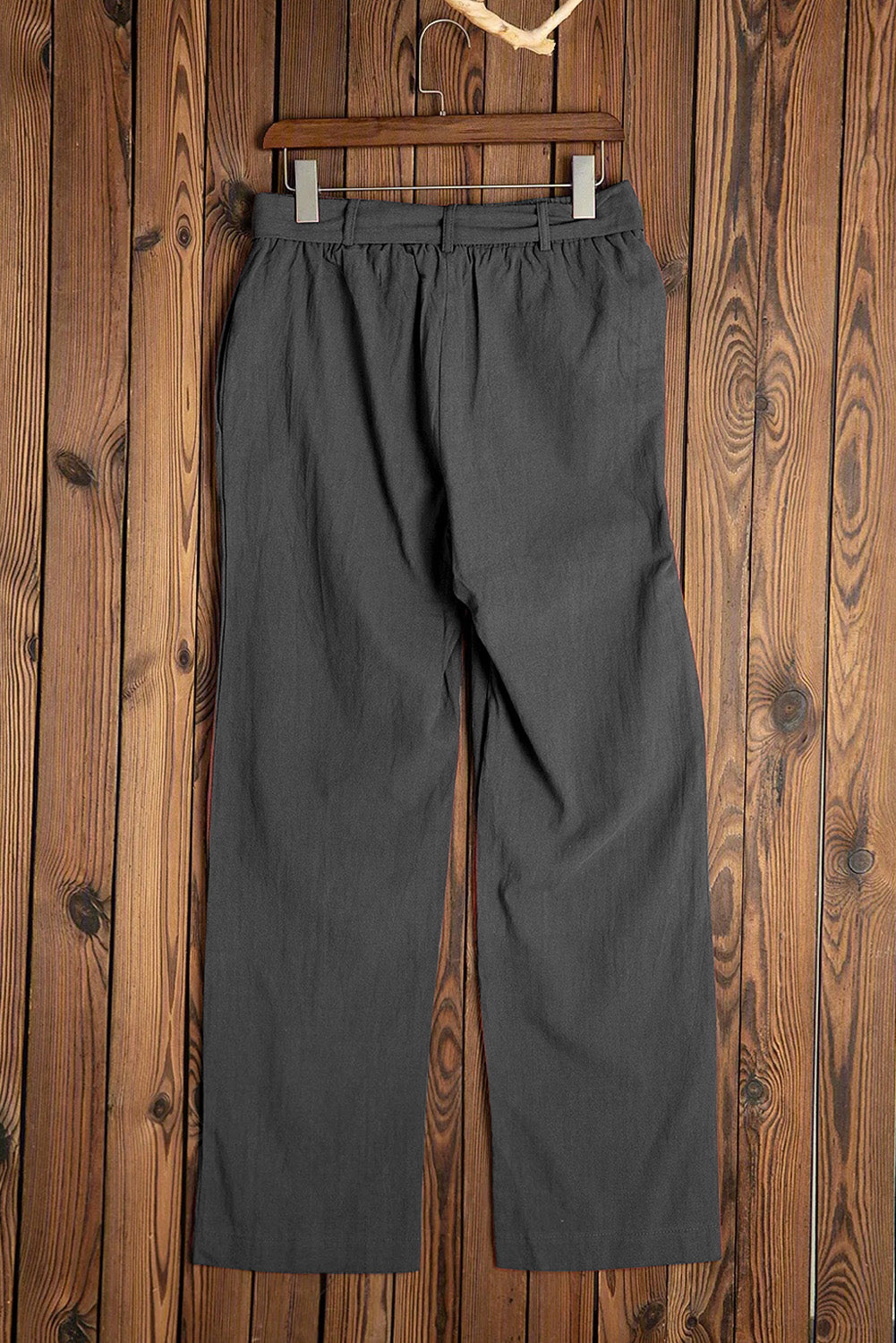 Black Elastic Waist Drawstring Wide Leg Pants displayed on a mannequin, showcasing the wide leg design and adjustable drawstring waist.