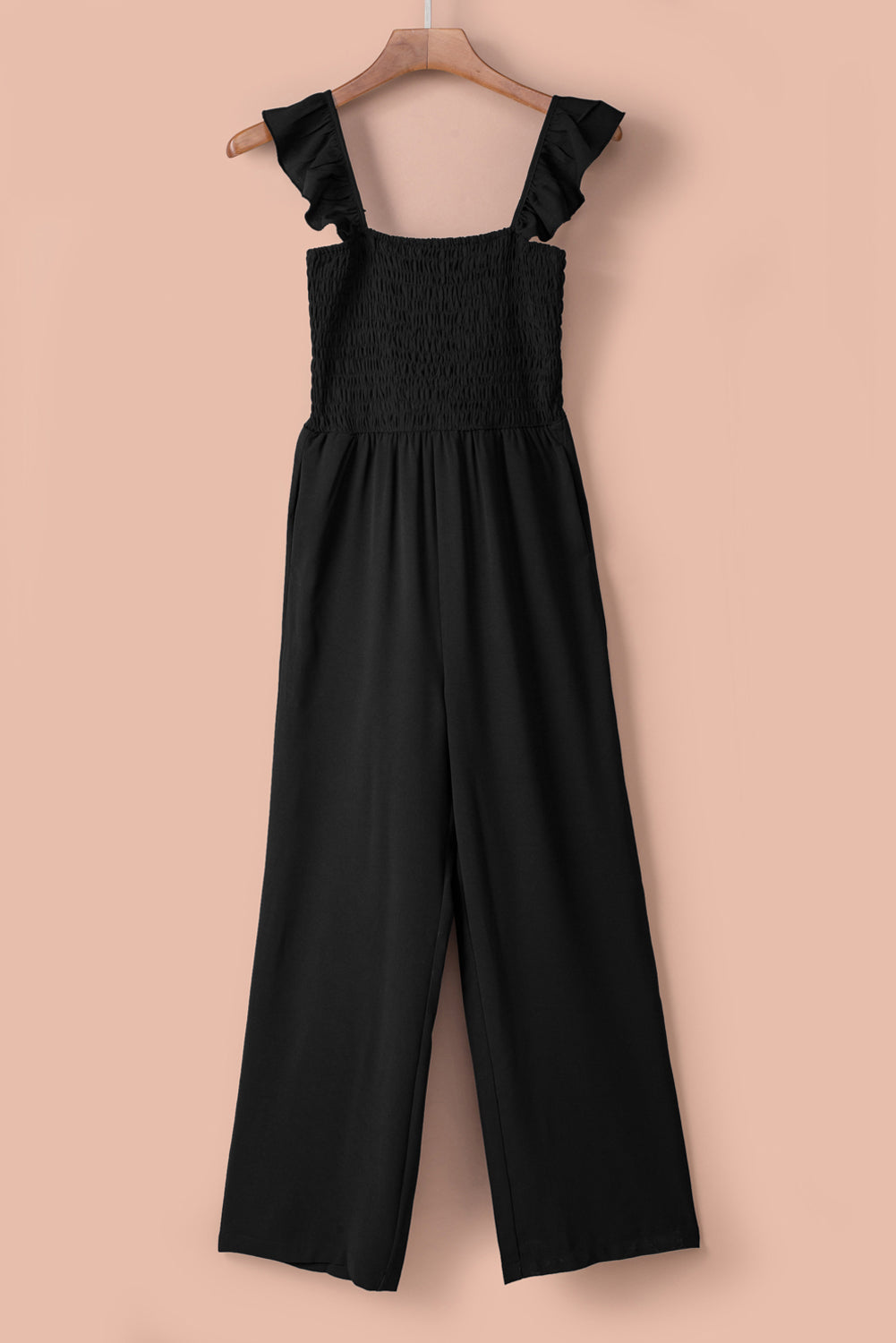 A stylish black jumpsuit featuring flutter sleeves, a smocked bodice, and wide leg bottoms, perfect for any occasion.