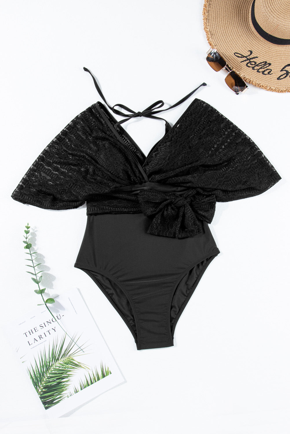 Black Lace Patchwork Short Sleeve Surplice Neck Monokini showcasing elegant lace design and flattering fit.