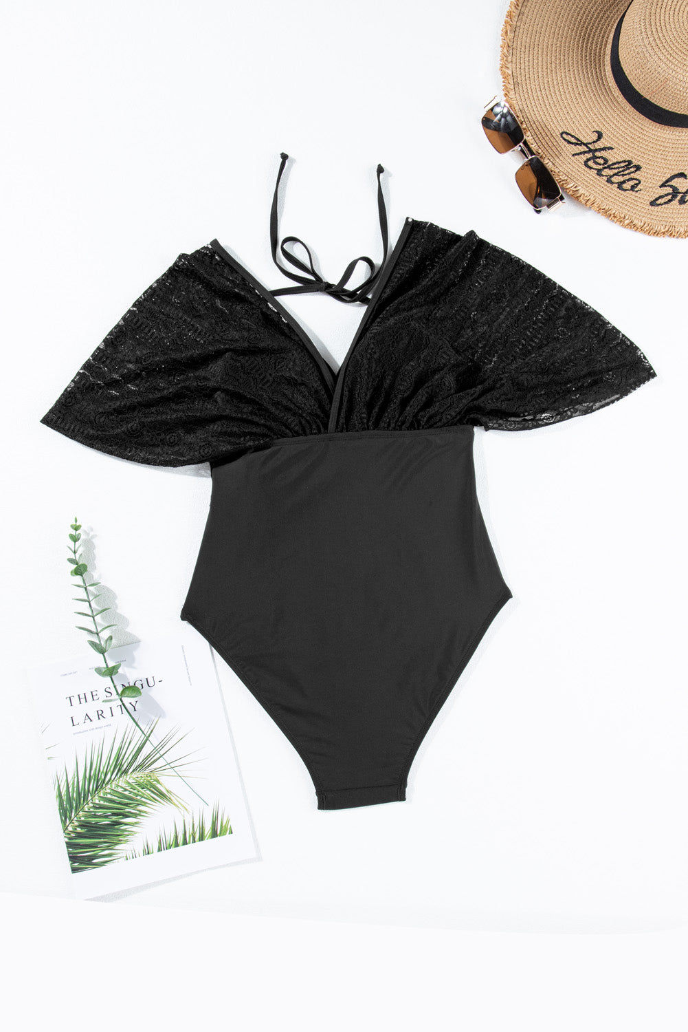 Black Lace Patchwork Short Sleeve Surplice Neck Monokini showcasing elegant lace design and flattering fit.