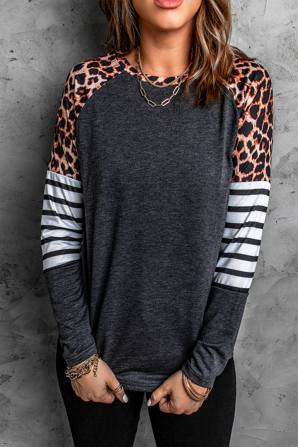 Black Leopard Striped Long Sleeve Top featuring a stylish mix of leopard print and striped patterns, perfect for casual wear.