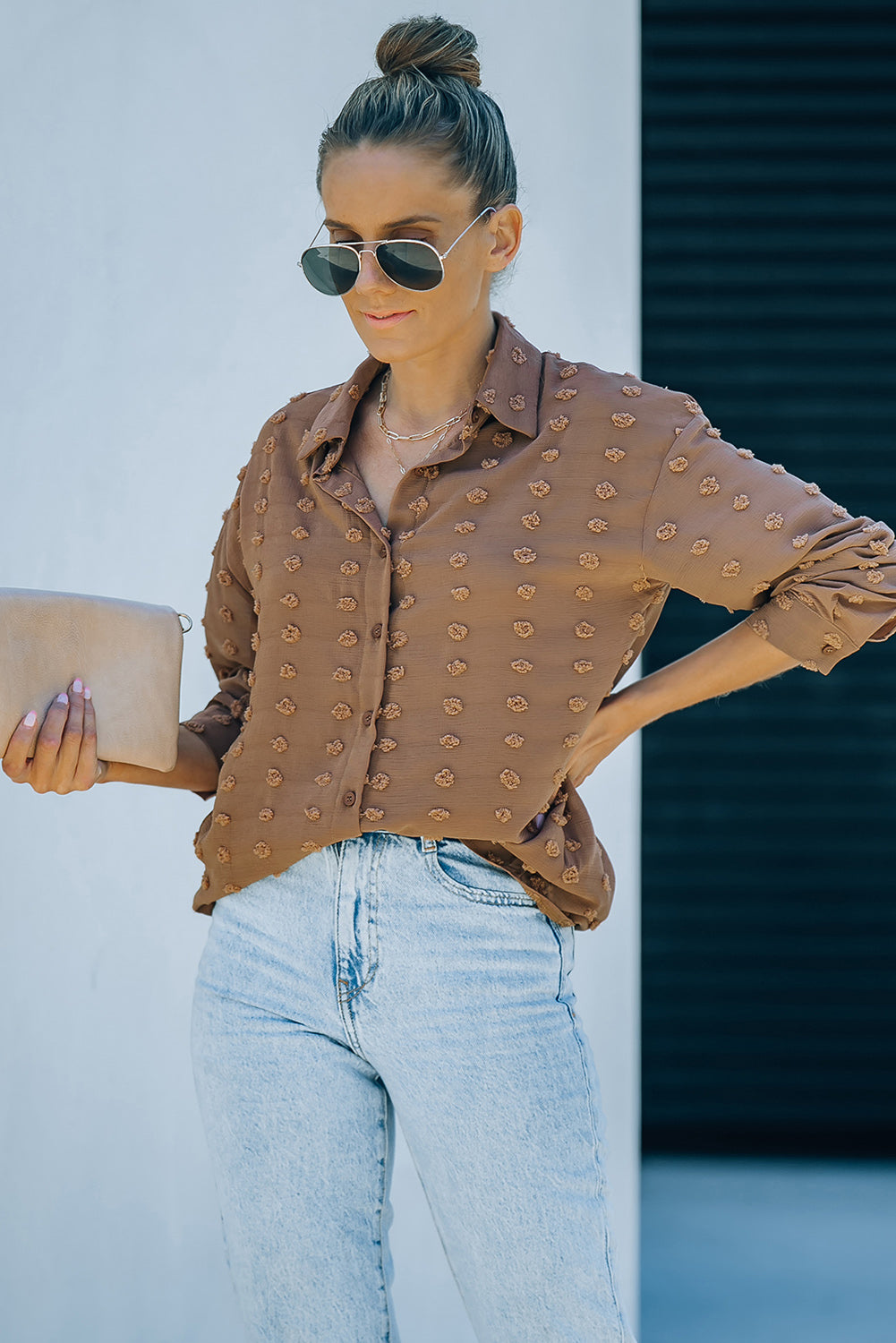 Black long sleeve shirt with fuzzy polka dot pattern, featuring button closure and relaxed fit, perfect for casual or formal wear.