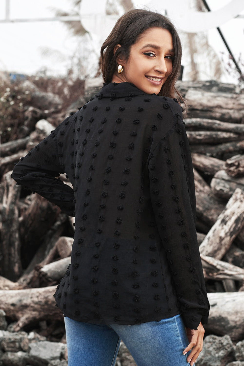 Black long sleeve shirt with fuzzy polka dot pattern, featuring button closure and relaxed fit, perfect for casual or formal wear.