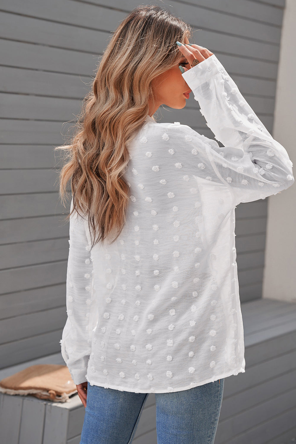 Black long sleeve shirt with fuzzy polka dot pattern, featuring button closure and relaxed fit, perfect for casual or formal wear.