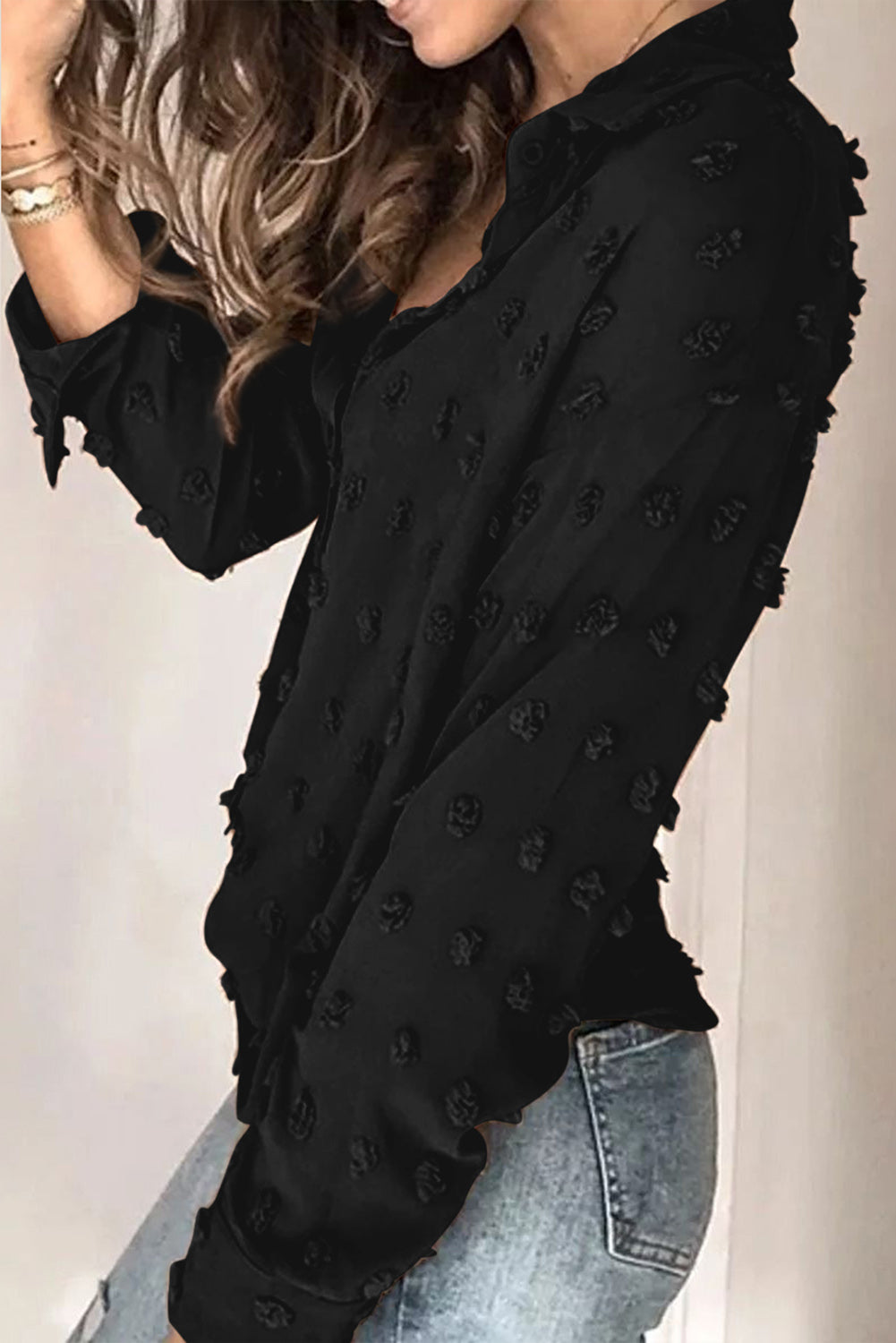 Black long sleeve shirt with fuzzy polka dot pattern, featuring button closure and relaxed fit, perfect for casual or formal wear.