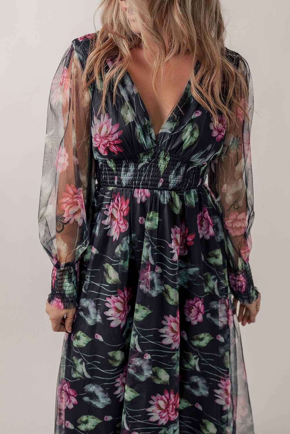 A stylish Black Mesh Sheer Shirred High Waist Floral Maxi Dress featuring a V-neckline and elegant floral patterns, perfect for various occasions.