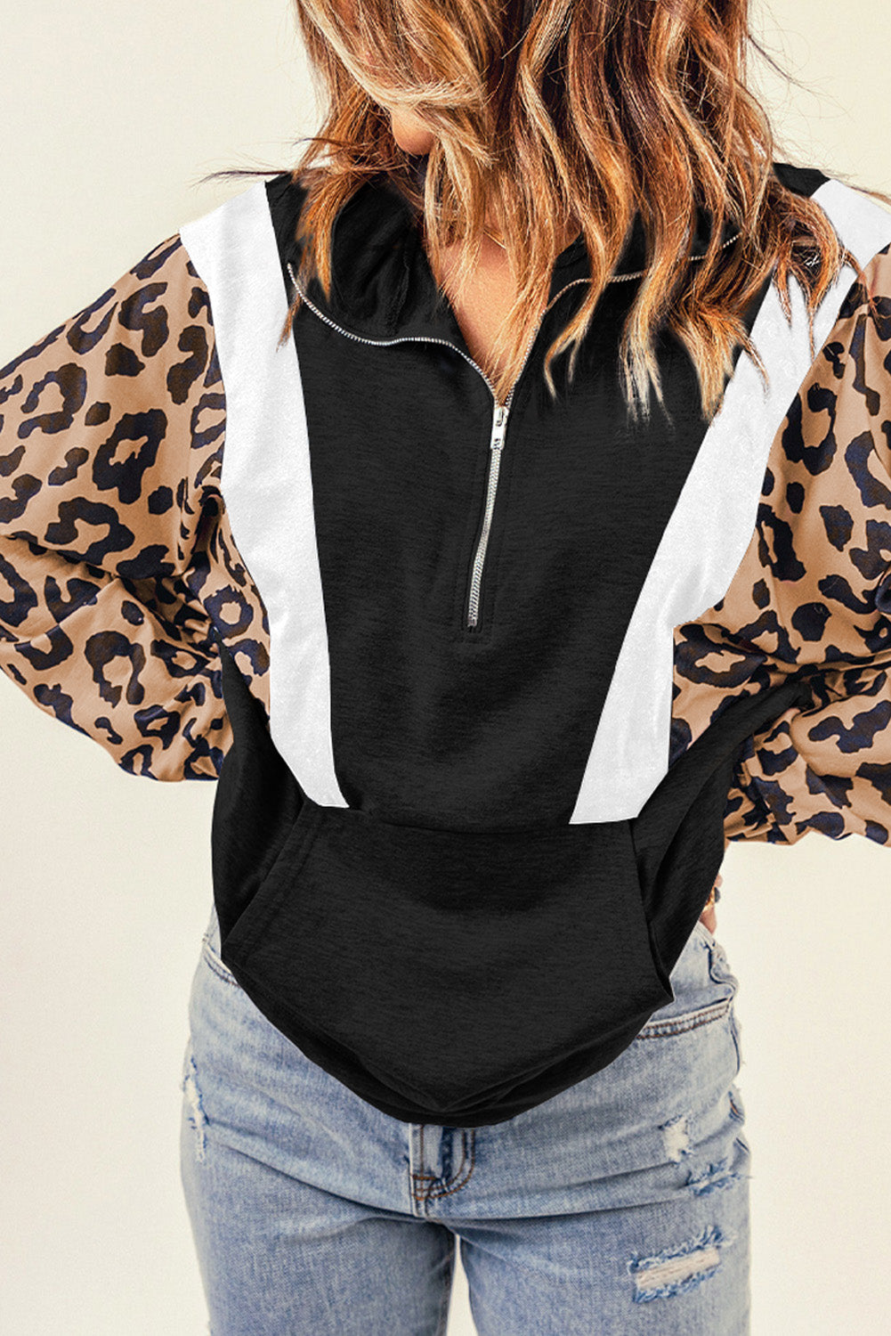 Black Pocketed Half Zip Leopard Pullover Sweatshirt featuring trendy leopard panels and a relaxed fit, perfect for casual wear.