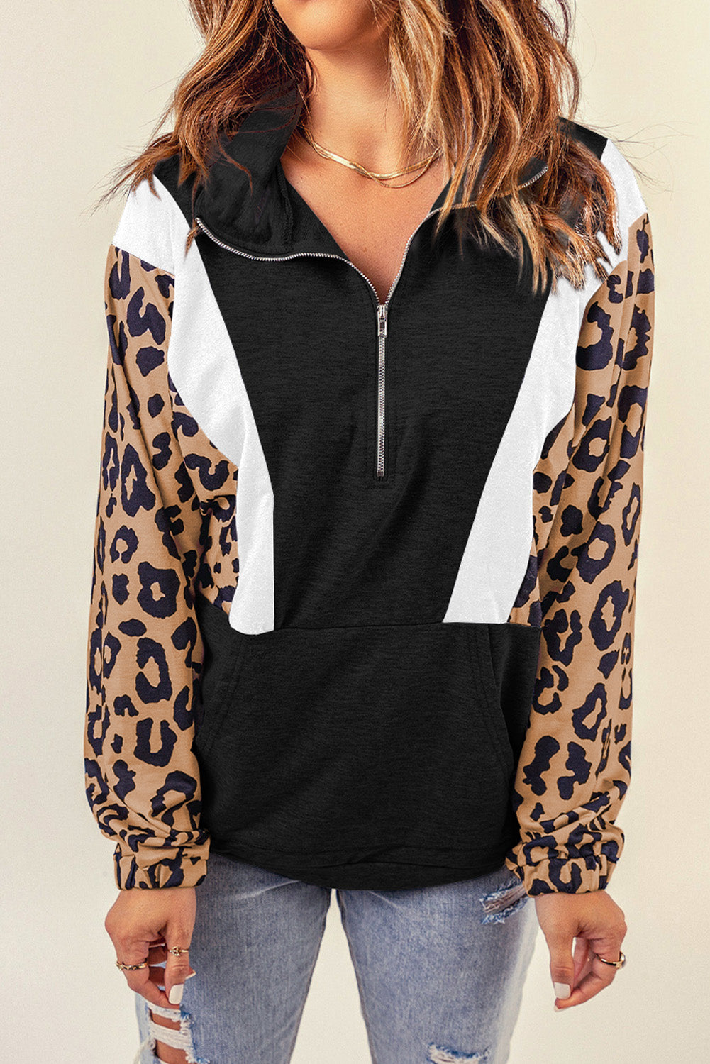 Black Pocketed Half Zip Leopard Pullover Sweatshirt featuring trendy leopard panels and a relaxed fit, perfect for casual wear.