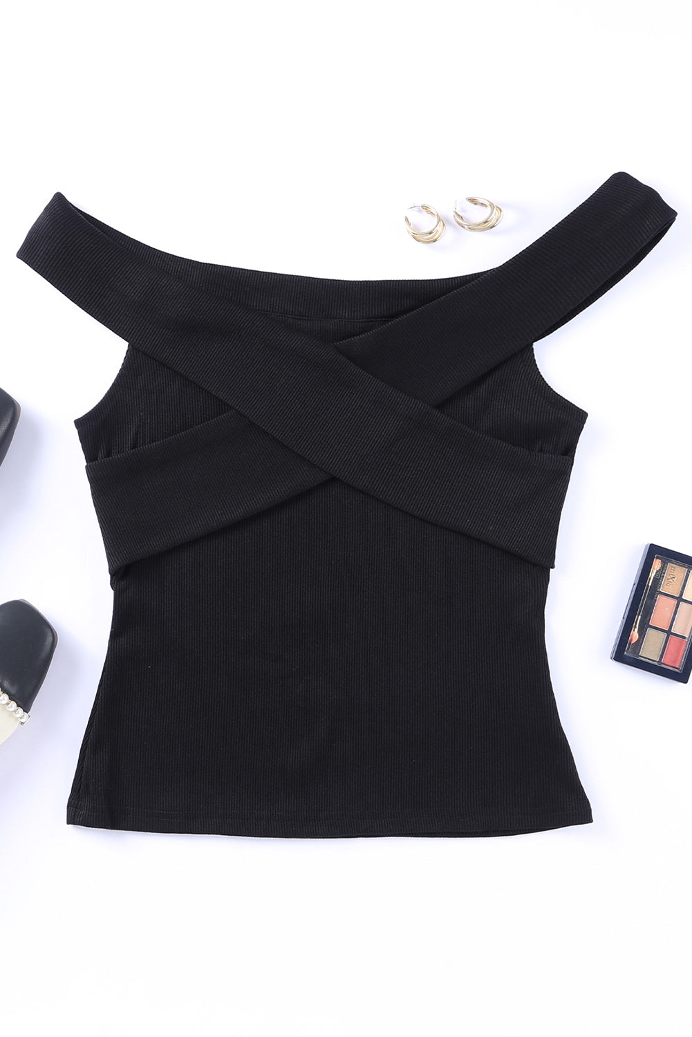 A stylish black ribbed off-shoulder top featuring a criss-cross design, showcasing a flattering slim-fit silhouette.