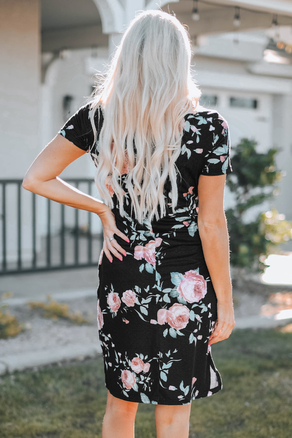 Black short sleeve casual floral dress with pockets and drawstring waist, perfect for summer outings.