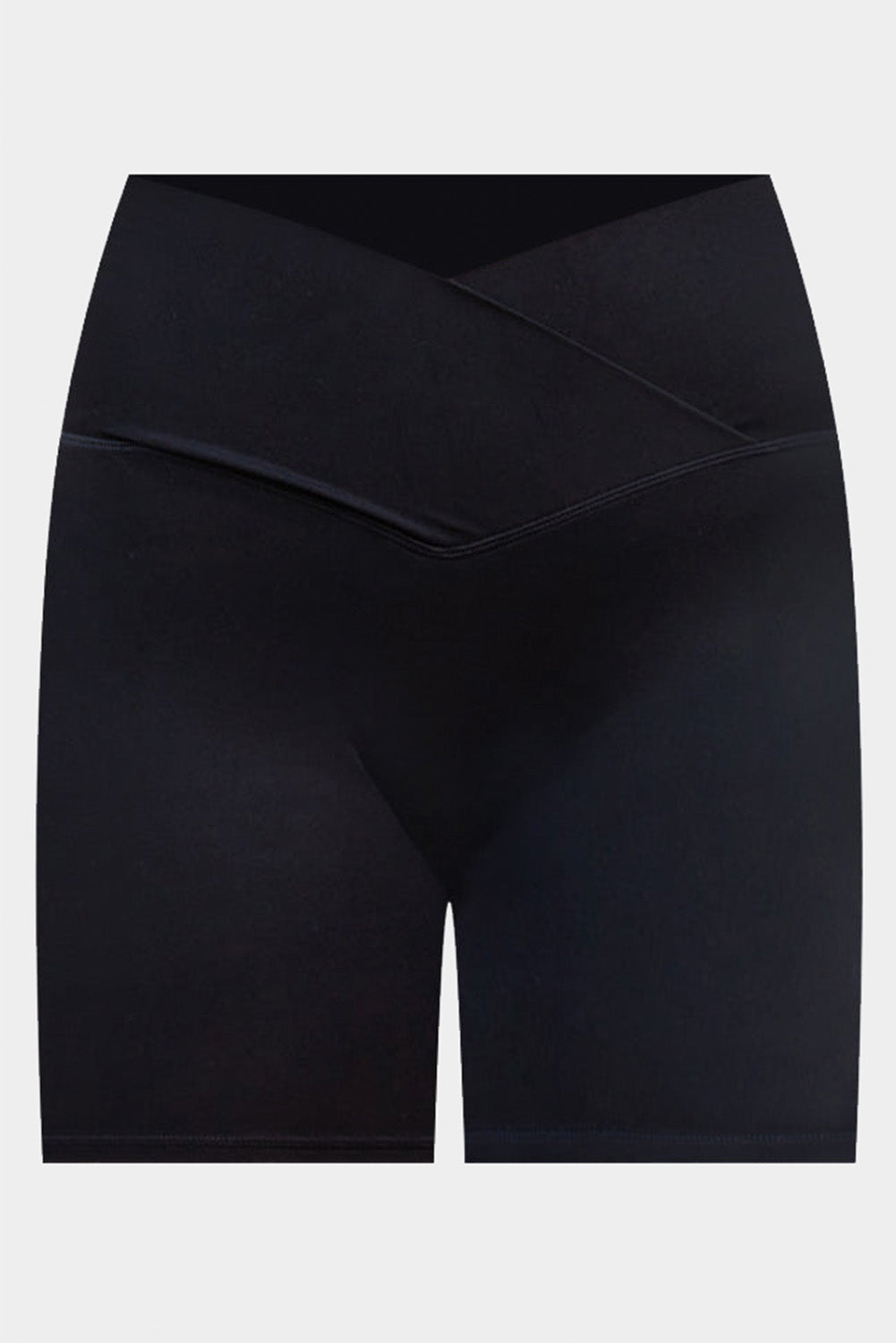 Black solid color yoga shorts with a V-shaped waistband, designed for comfort and style during workouts.