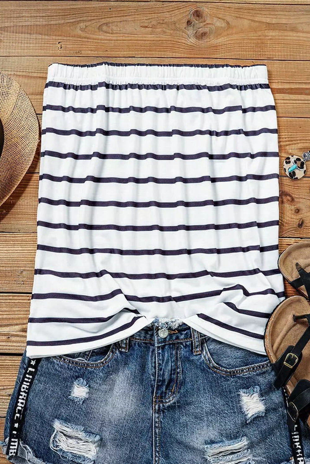 Black Striped Strapless Bandeau Tank showcasing a classic striped pattern, perfect for summer styling.