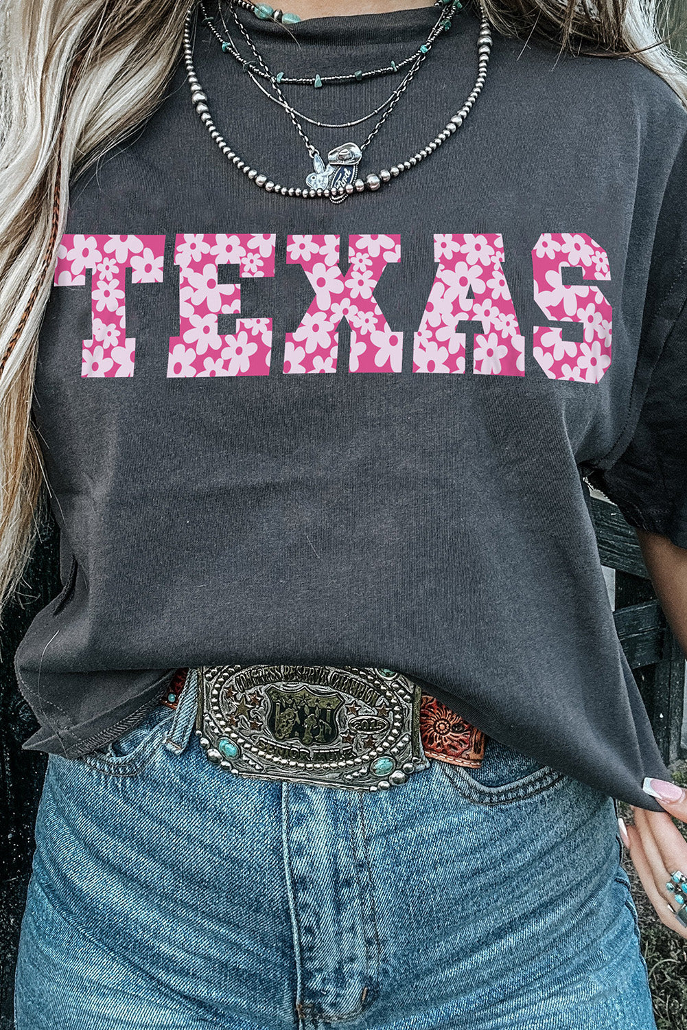 Black TEXAS Graphic Mineral Wash T-shirt featuring a bold TEXAS print, showcasing a stylish and comfortable design suitable for casual wear.