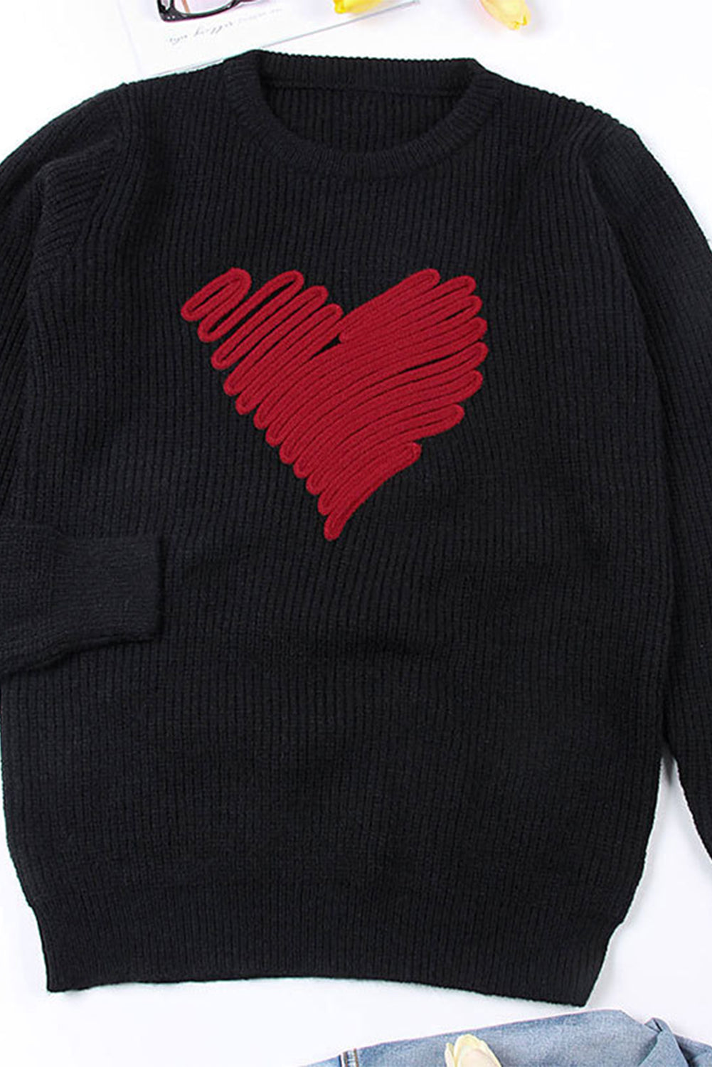 Black round neck sweater featuring a romantic heart sketch design, perfect for winter wear.