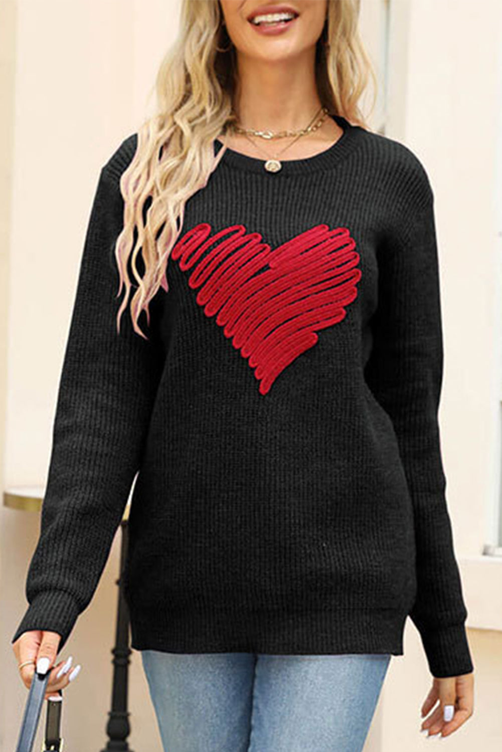 Black round neck sweater featuring a romantic heart sketch design, perfect for winter wear.