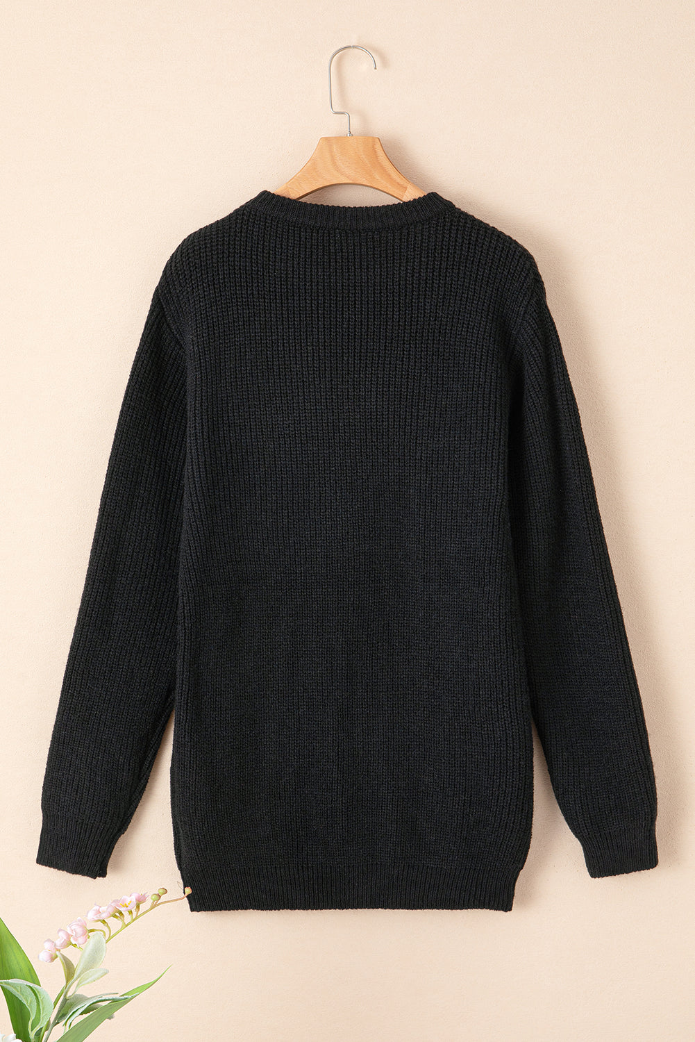 Black round neck sweater featuring a romantic heart sketch design, perfect for winter wear.