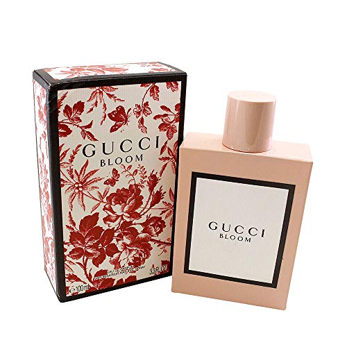 Gucci Bloom Eau de Parfum bottle showcasing its elegant floral design, symbolizing femininity and individuality.