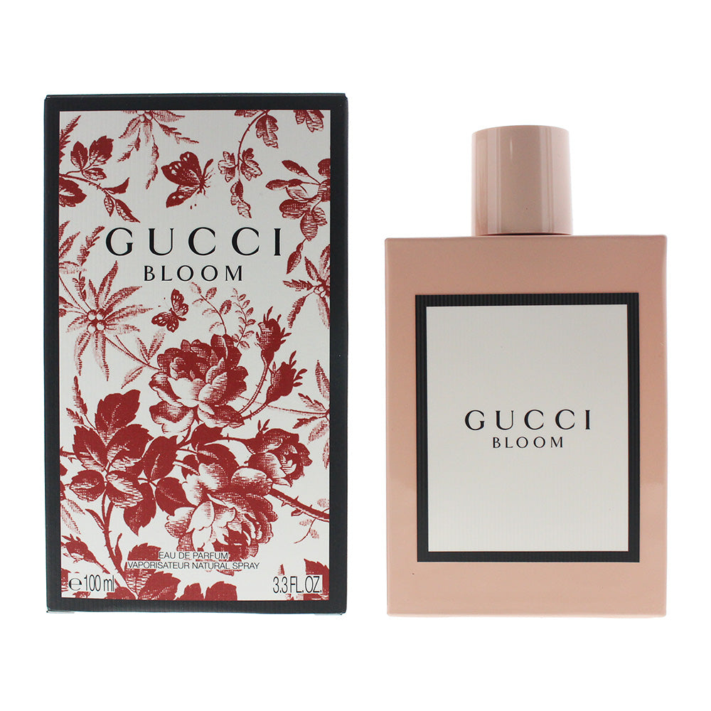 Gucci Bloom Eau de Parfum bottle showcasing its elegant floral design, symbolizing femininity and individuality.