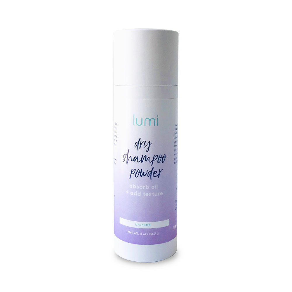 A bottle of blonde dry shampoo powder with a natural and eco-friendly design, ideal for refreshing blonde and grey hair.