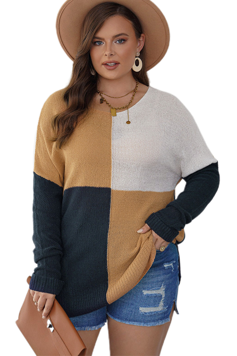 A stylish blue color block plus size sweater featuring side slits, designed for comfort and a chic look.