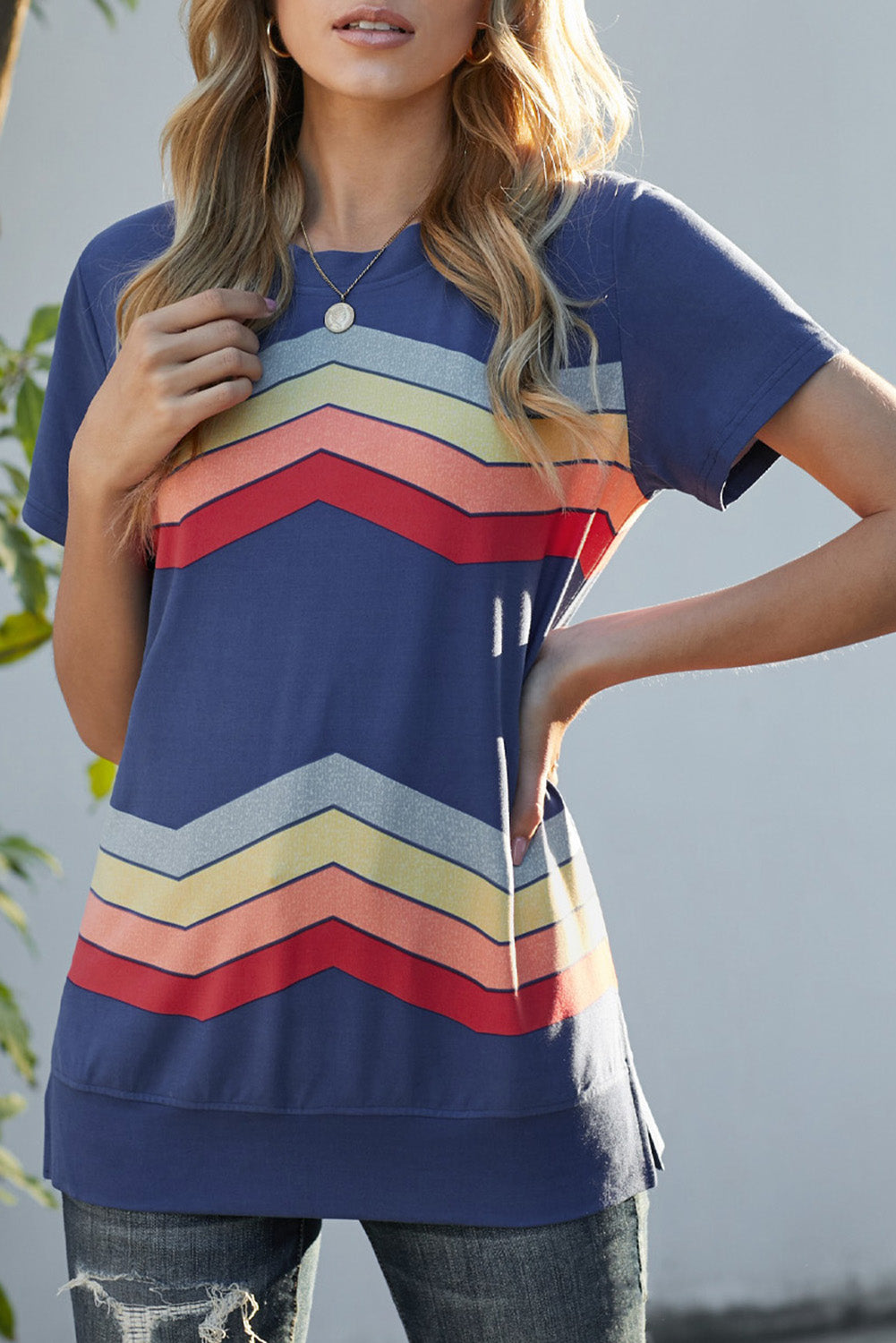 Blue short sleeve tee featuring colorful wavy stripes print, perfect for casual wear.