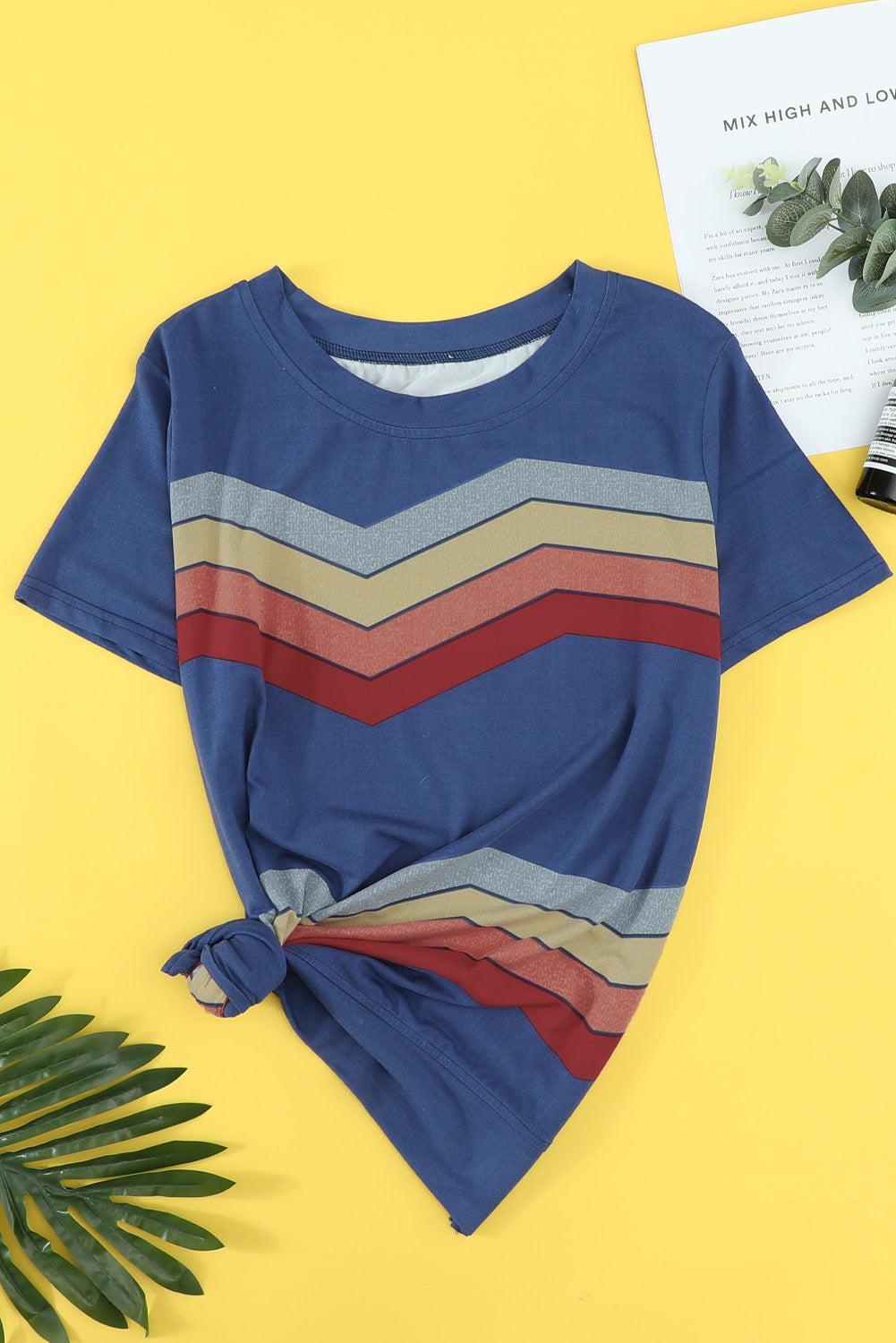 Blue short sleeve tee featuring colorful wavy stripes print, perfect for casual wear.