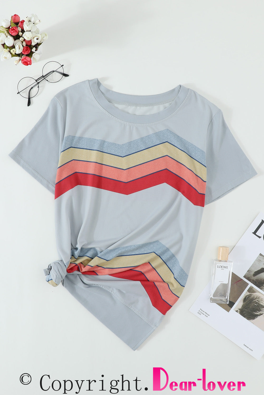 Blue short sleeve tee featuring colorful wavy stripes print, perfect for casual wear.