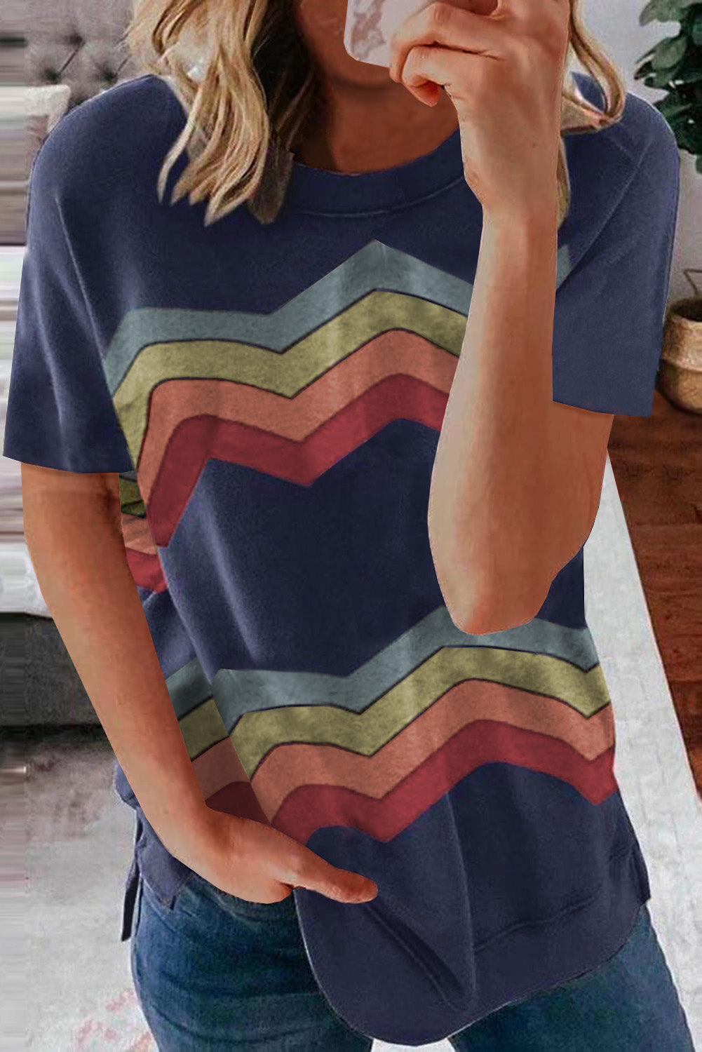 Blue short sleeve tee featuring colorful wavy stripes print, perfect for casual wear.