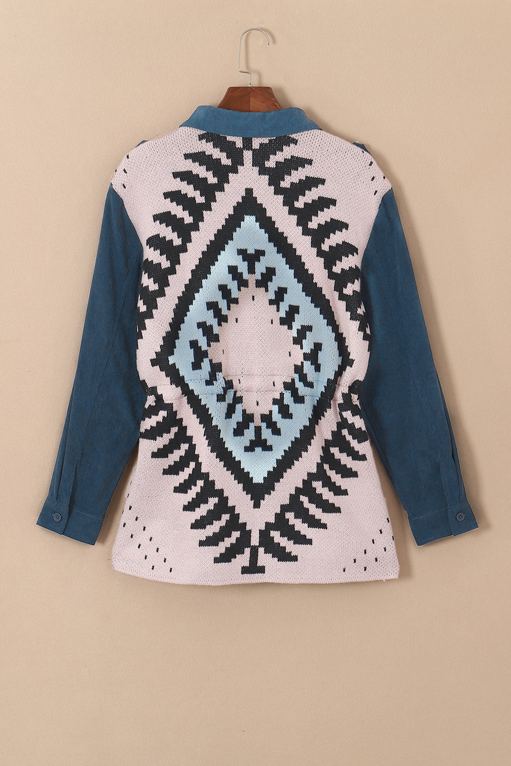 Blue plus size corduroy jacket with Aztec print back, featuring a loose fit, drawstring waist, and flap pockets.