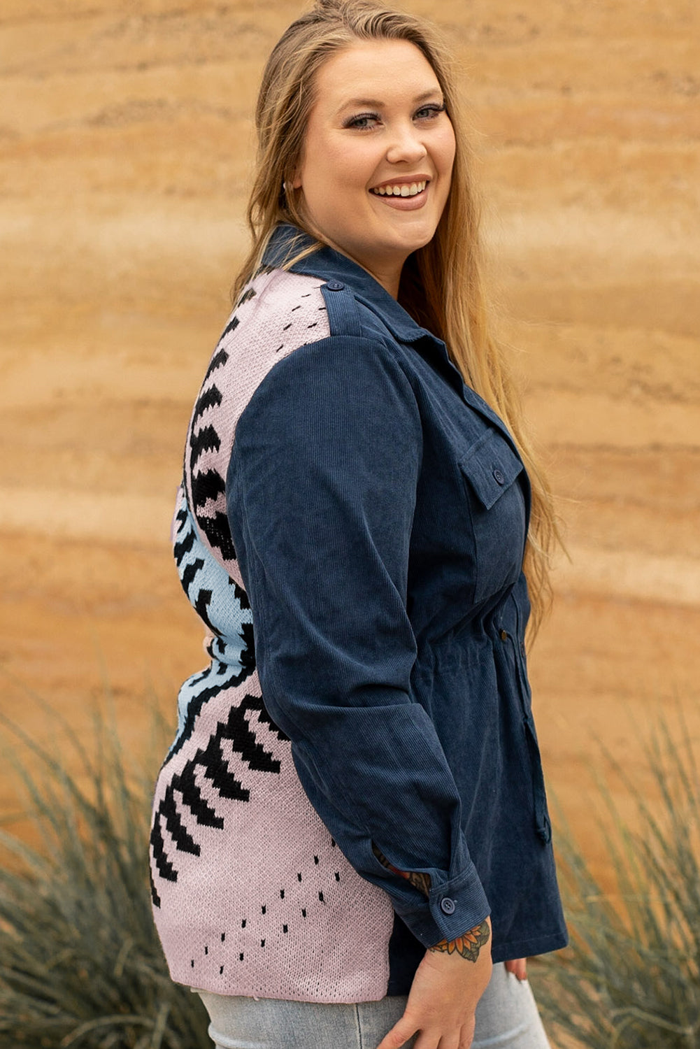 Blue plus size corduroy jacket with Aztec print back, featuring a loose fit, drawstring waist, and flap pockets.