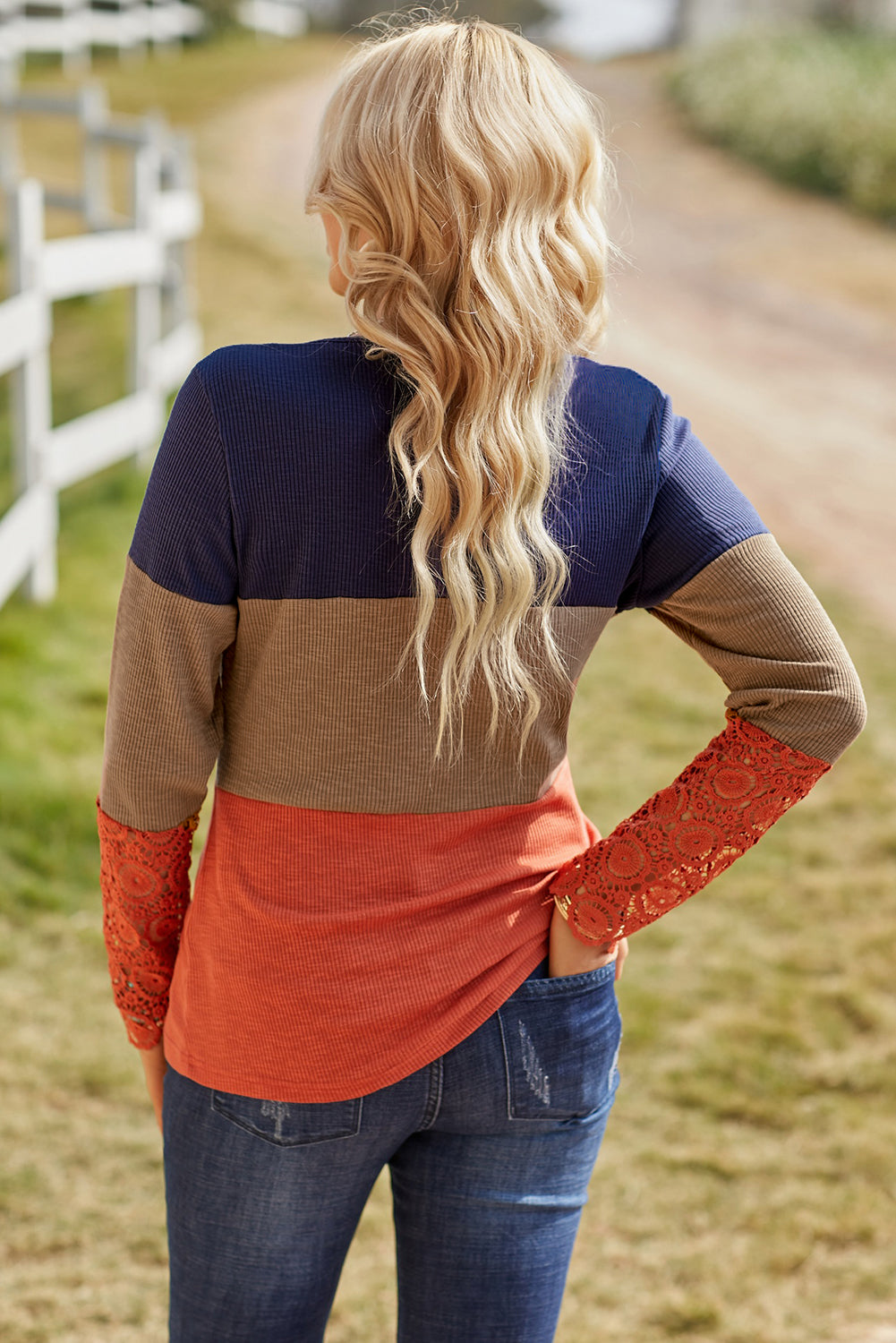 Blue ribbed long sleeve top featuring lace splicing and color block design, perfect for casual and trendy outfits.