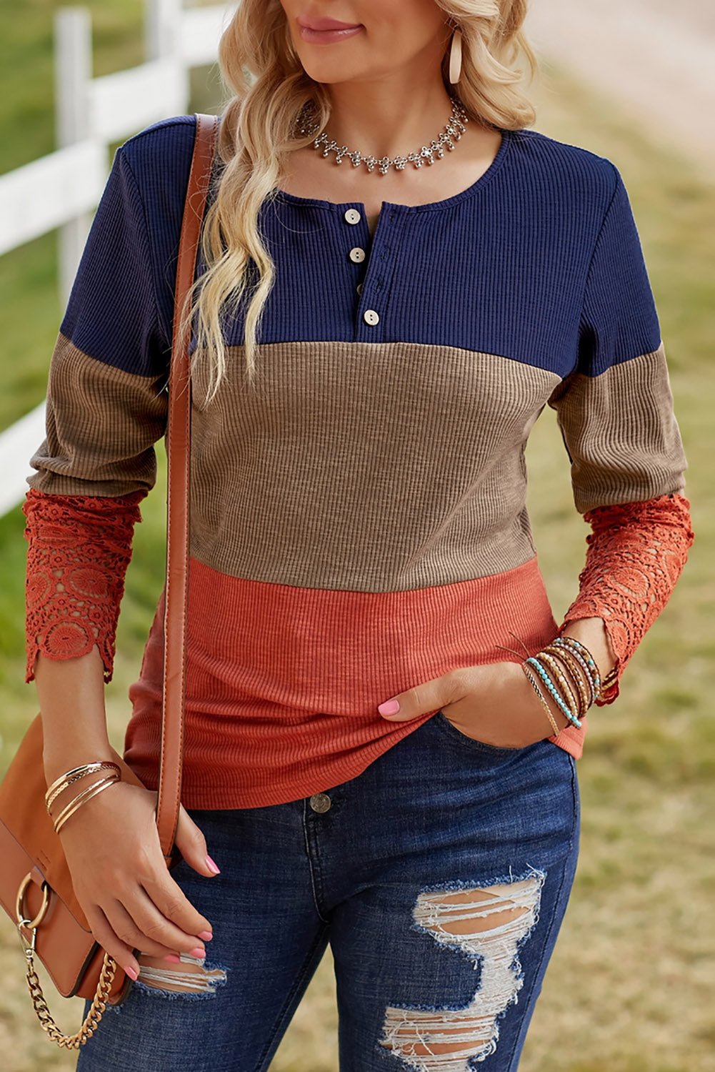 Blue ribbed long sleeve top featuring lace splicing and color block design, perfect for casual and trendy outfits.