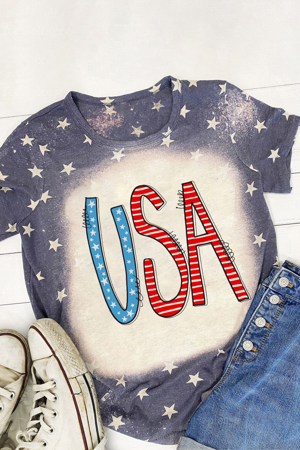 Blue Tie Dye Stripes and Stars USA Print T Shirt featuring a vibrant tie dye pattern with stars and stripes design.