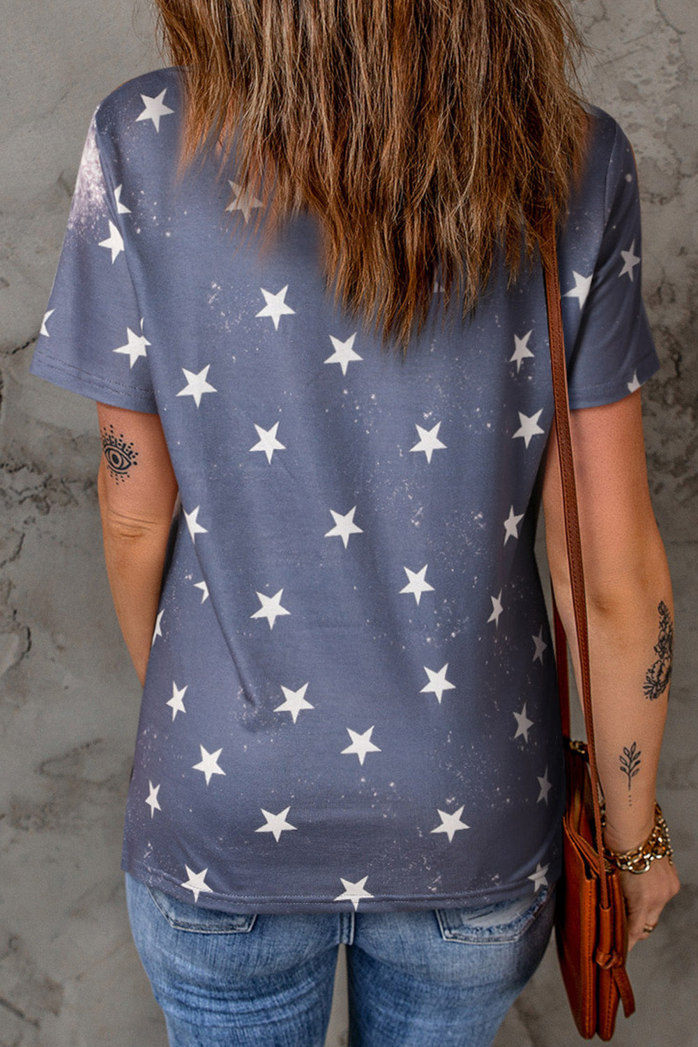 Blue Tie Dye Stripes and Stars USA Print T Shirt featuring a vibrant tie dye pattern with stars and stripes design.