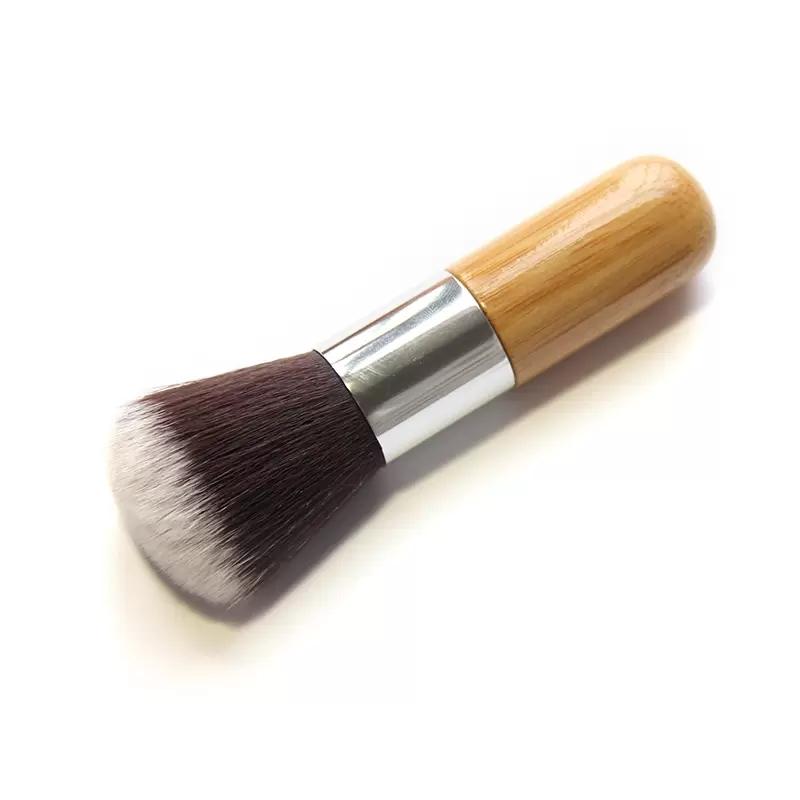 A high-quality blush brush with soft synthetic bristles, designed for flawless makeup application and suitable for sensitive skin.