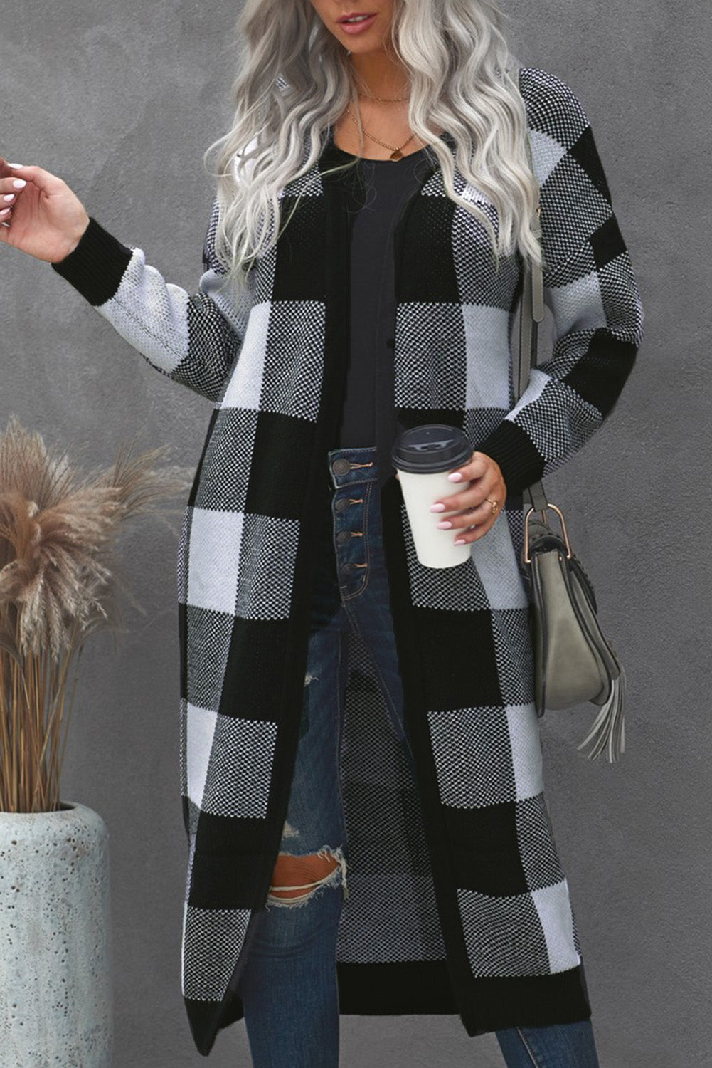 A stylish Board Games Pocketed Checkered Cardigan featuring a monochrome plaid print, open front design, and cozy fabric, perfect for chilly weather.