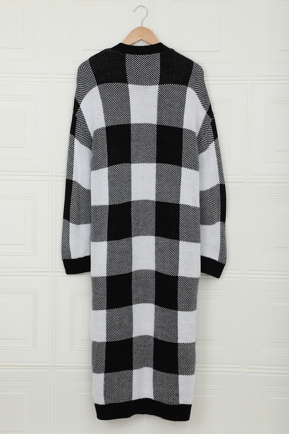 A stylish Board Games Pocketed Checkered Cardigan featuring a monochrome plaid print, open front design, and cozy fabric, perfect for chilly weather.