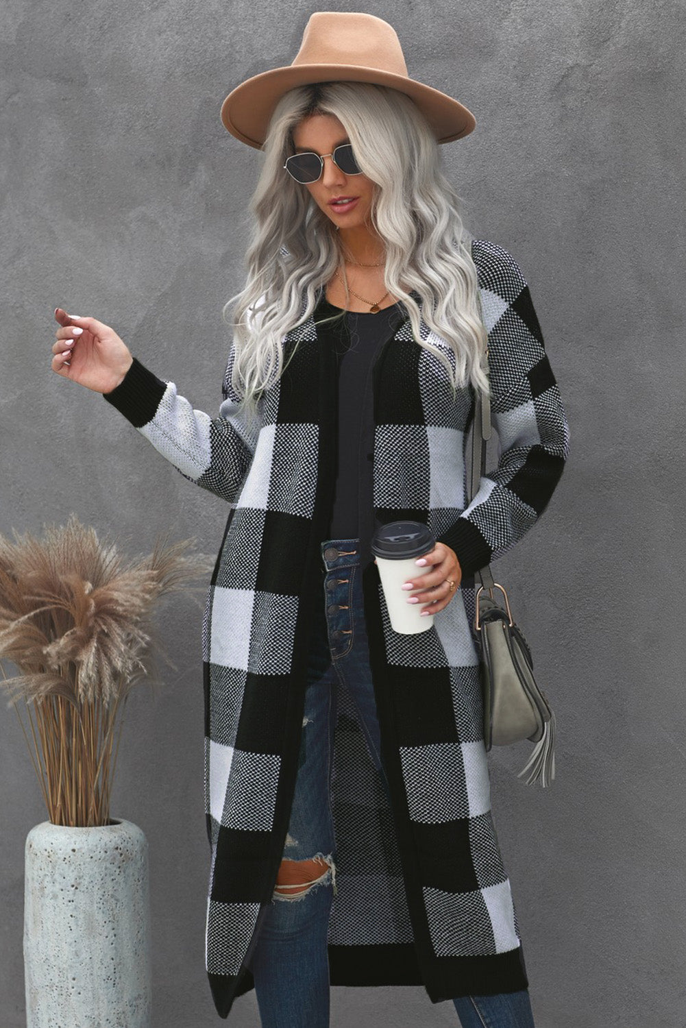 A stylish Board Games Pocketed Checkered Cardigan featuring a monochrome plaid print, open front design, and cozy fabric, perfect for chilly weather.