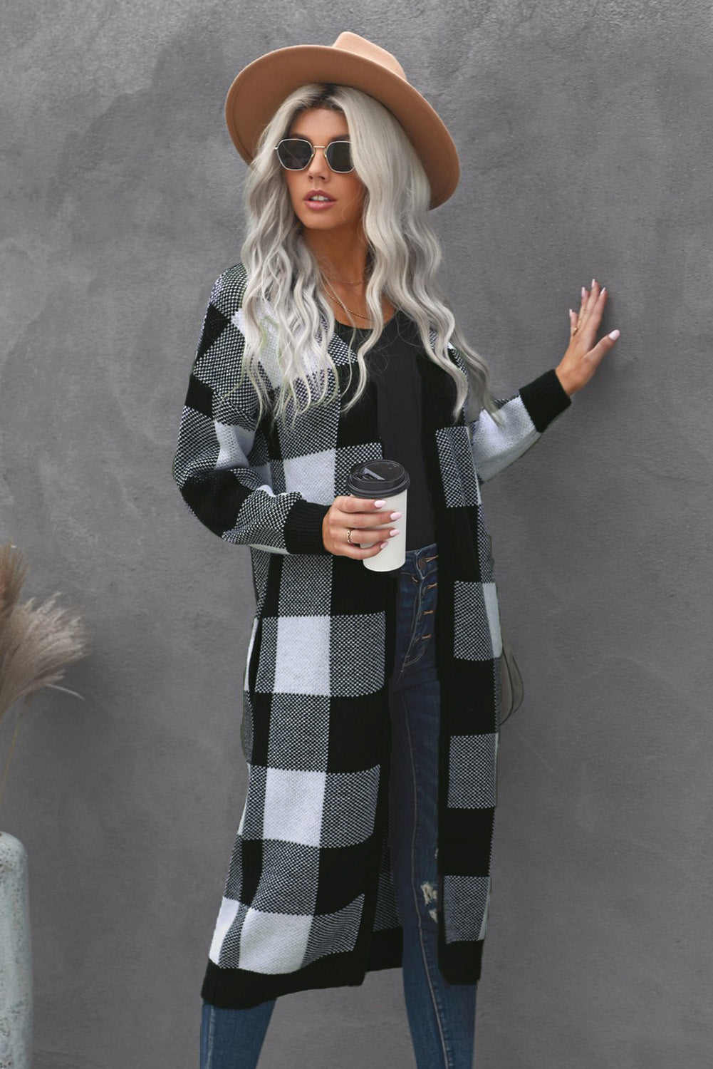 A stylish Board Games Pocketed Checkered Cardigan featuring a monochrome plaid print, open front design, and cozy fabric, perfect for chilly weather.